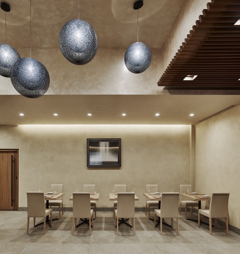 Kenzo Napa dining room is at ground level featuring seating and minimal decor with custom light fixtures